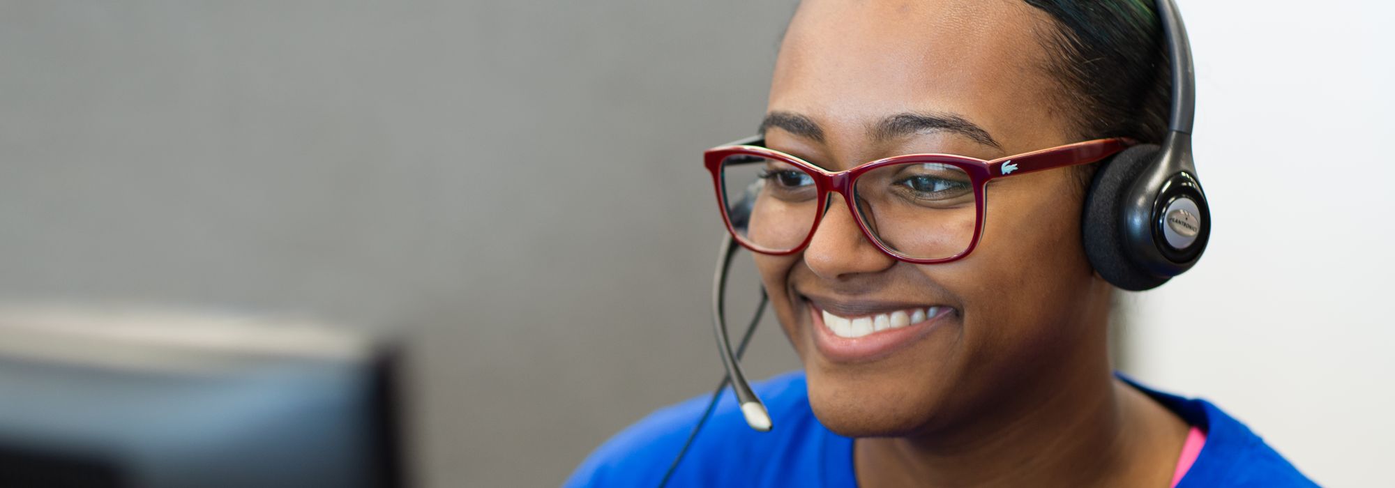 Photo of woman wearing headset