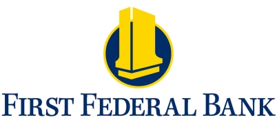 First Federal Bank logo with a yellow open-book emblem inside a blue circle and the words “FIRST FEDERAL BANK” in blue text on a white background.