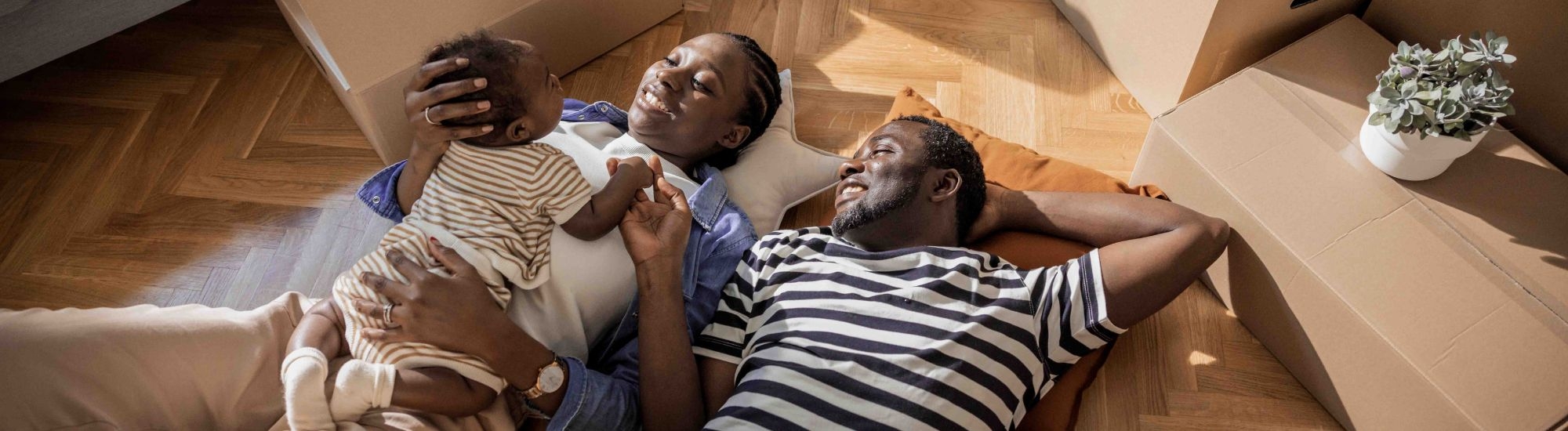 Young family lying on the floor
